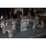 A selection of Lladro figures and groups, together with some similar figure groups. £60-80