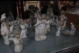 A selection of Lladro figures and groups, together with some similar figure groups. £60-80