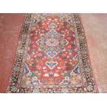 A Persian Sarough rug 200 x 120cm £120-180