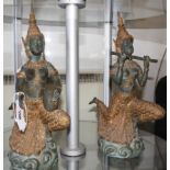 A pair of verdi gris and gold finished bronze figurines of female Thai dancing musicians.41cm