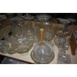 A quantity of glass centrepieces, decanters, a celery vase and cut glass boxes. £60-80
