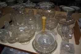 A quantity of glass centrepieces, decanters, a celery vase and cut glass boxes. £60-80