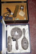 A collection of items, to include: a cased silver mounted three piece dressing table set by W. I.