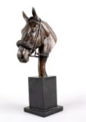 Denise Dutton, late 20th century, a patinated bronze model of the head of a racehorse, portrayed