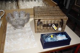 Decanter and stopper, cut glass rose bowl, wicker basket and two lace mats, a quantity of