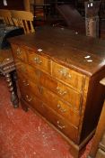 An 18th Century and later oak and walnut chest of drawers with three short and three long drawers £