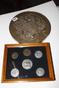 A bronze effect circular Royal Coat of Arms Medallion celebrating the Queen's Golden Jubilee 2002