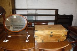 A brass bound camphor wood chest 60cm wide and an oval swing toilet mirror. £80-120