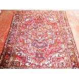 A Persian Heriz carpet 250 x 212cm £100-150