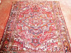 A Persian Heriz carpet 250 x 212cm £100-150
