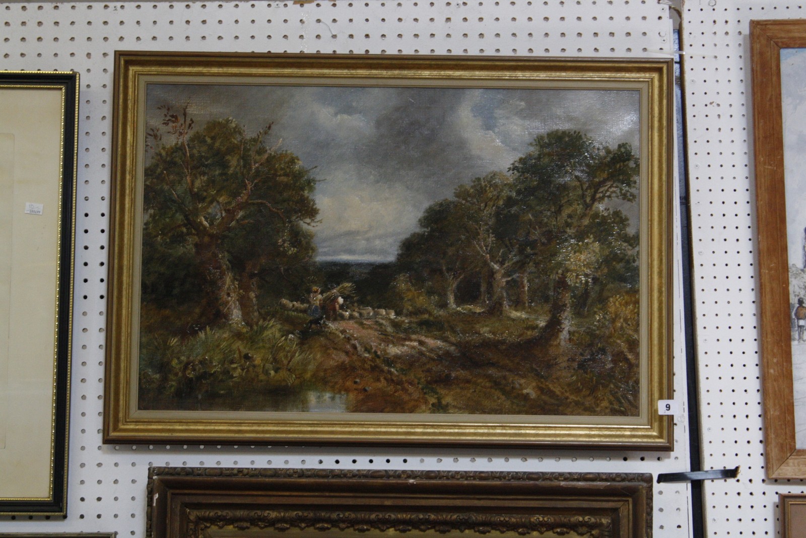 British School (Late 19th Century) Figures on woodland path Oil on canvas Signed indistinctly