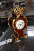 A contintal18th c style Rococo clock faux tortoise shell case and gilt ormolu mounts.20cm high. £