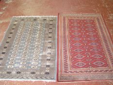 A Pakistan Bokhara rug, and another pale blue Bokhara rug £100-150