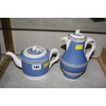 An 18th Century blue and white creamware teapot and hot water jug. £40-60