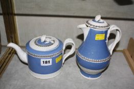 An 18th Century blue and white creamware teapot and hot water jug. £40-60