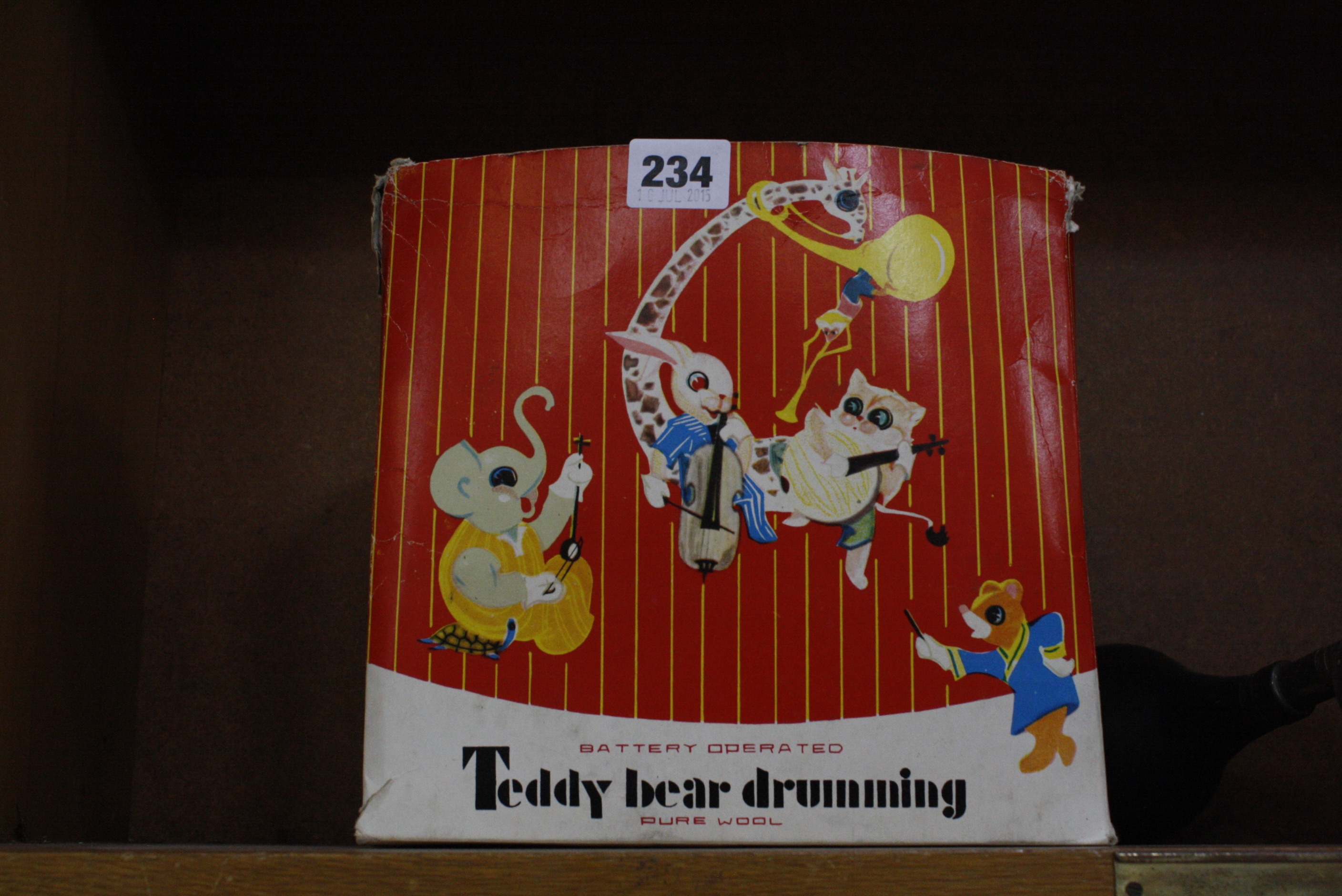 A Chinese made battery operated Teddy Bear Drumming in it's original box. £50-100