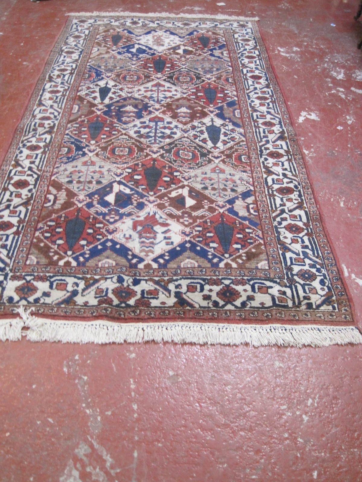 A Bakhtiar carpet 310 x 160cm