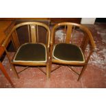 A pair of Edwardian mahogany and inlaid tub chairs with upholstered seats Best Bid