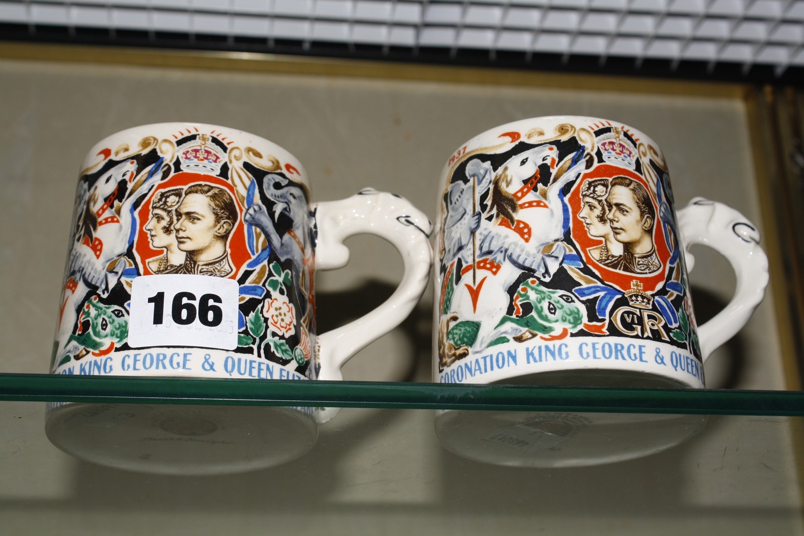 Three Coronation mugs, George VI and Queen Elizabeth, designed by Dame Laura Knight.