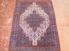 A Persian Senneh rug