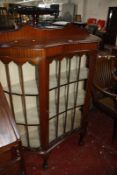 A Georgian style glazed display cabinet 109cm wide and a modern floorstanding corner cupboard Best