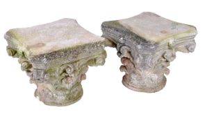 A pair of stone composition column capitals, 20th century, of Corinthian order, 45cm high, 52cm