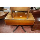 A Georgian style drop leaf table and a mahogany plant stand and a reproduction mahogany chest of