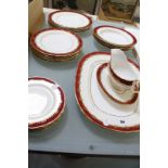 An Aynsley 'Rutland' burgundy part dinner service, pattern no: 8013, circa 1920, including one