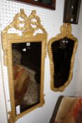 A wall mirror in Continental 18th Century style 104cm high, 47cm wide and another gilt frame mirror