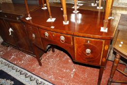 A George III mahogany and inlaid bowfront sideboard 107cm wide