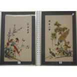 A pair 20th Century Chinese embroidered silkwork pictures, depicting exotic birds, 58.5cm x 34cm