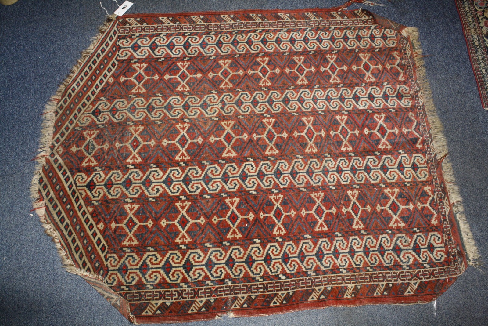 A Yomud Asmalyk rug with rows of vertical guls, dated, 120 x 98cm