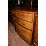 A 19th Century mahogany bowfront chest with two short and three long drawers on bun feet 108cm wide