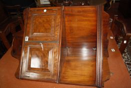 A late 19th/early 20th Century mahogany hanging corner cabinet 89cm high, 56cm wide