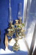 A Verdis Gris five branch candelabra, 43cm high and two coloured glass oil lamps -3