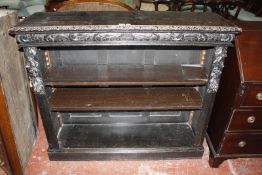 A carved oak open bookcase with adjustable shelves 123cm wide Best Bid
