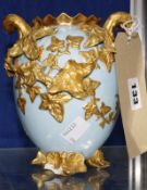 A Coalport ovoid vase with shaped rim and loop handles, 15.5cm high Best Bid