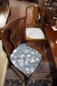 A pair of George III elm dining chairs and two others, and a pair of ladder-back chairs, also with a