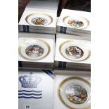 Twelve Royal Copenhagen plates depicting scenes from Hans Christian Andersen tales (boxed).