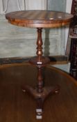 A Regency and later rosewood chess top table on a slender turned column with triform base. Best Bid