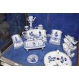 A small quantity of early 20th century blue and white Delft, including clogs, three piece suite,