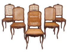 A set of six French walnut and canework dining chairs, late 19th century/early 20th century, each