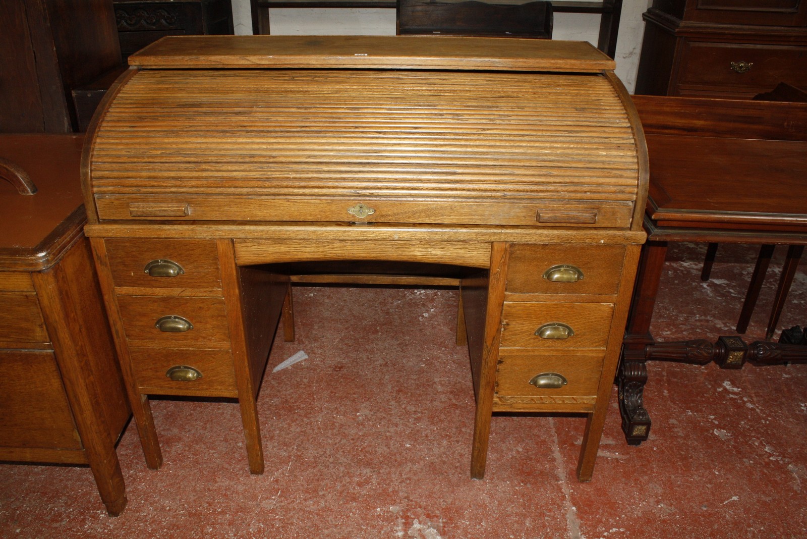 An early 20th Century oak roll top desk, with tambour front and six short drawers on square - Image 3 of 3