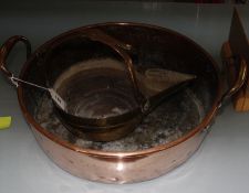 A copper two-handled bowl and a copper and brass pourer -2 Best Bid