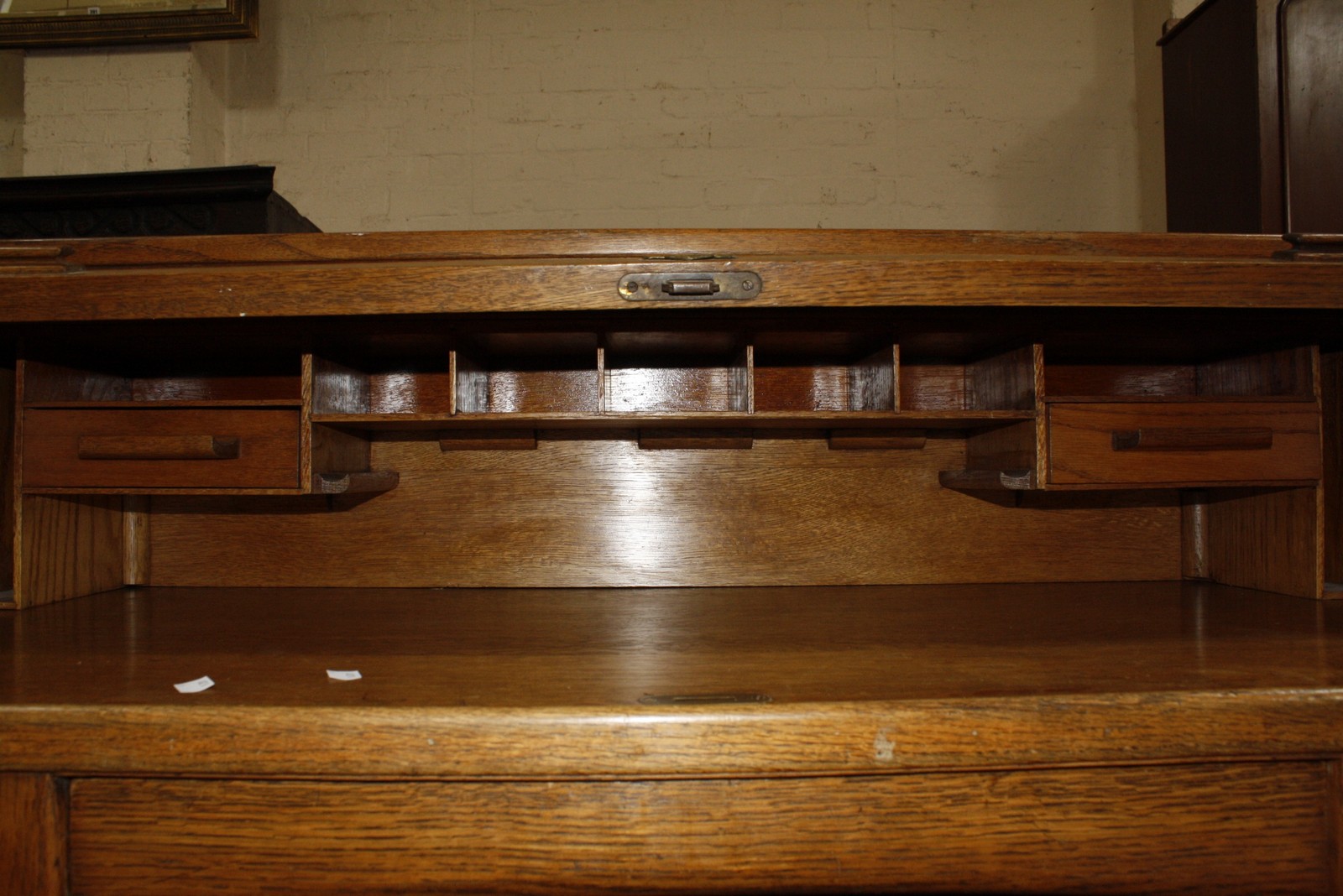 An early 20th Century oak roll top desk, with tambour front and six short drawers on square - Image 2 of 3