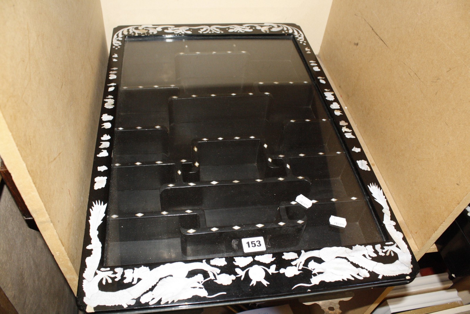 A pair of Chinese black lacquer and mother of pearl inlaid display cabinets with shelves, 69cm x