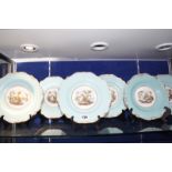 Six mid 19th century Staffordshire turquoise-ground dessert plates decorated with rustic scenes,