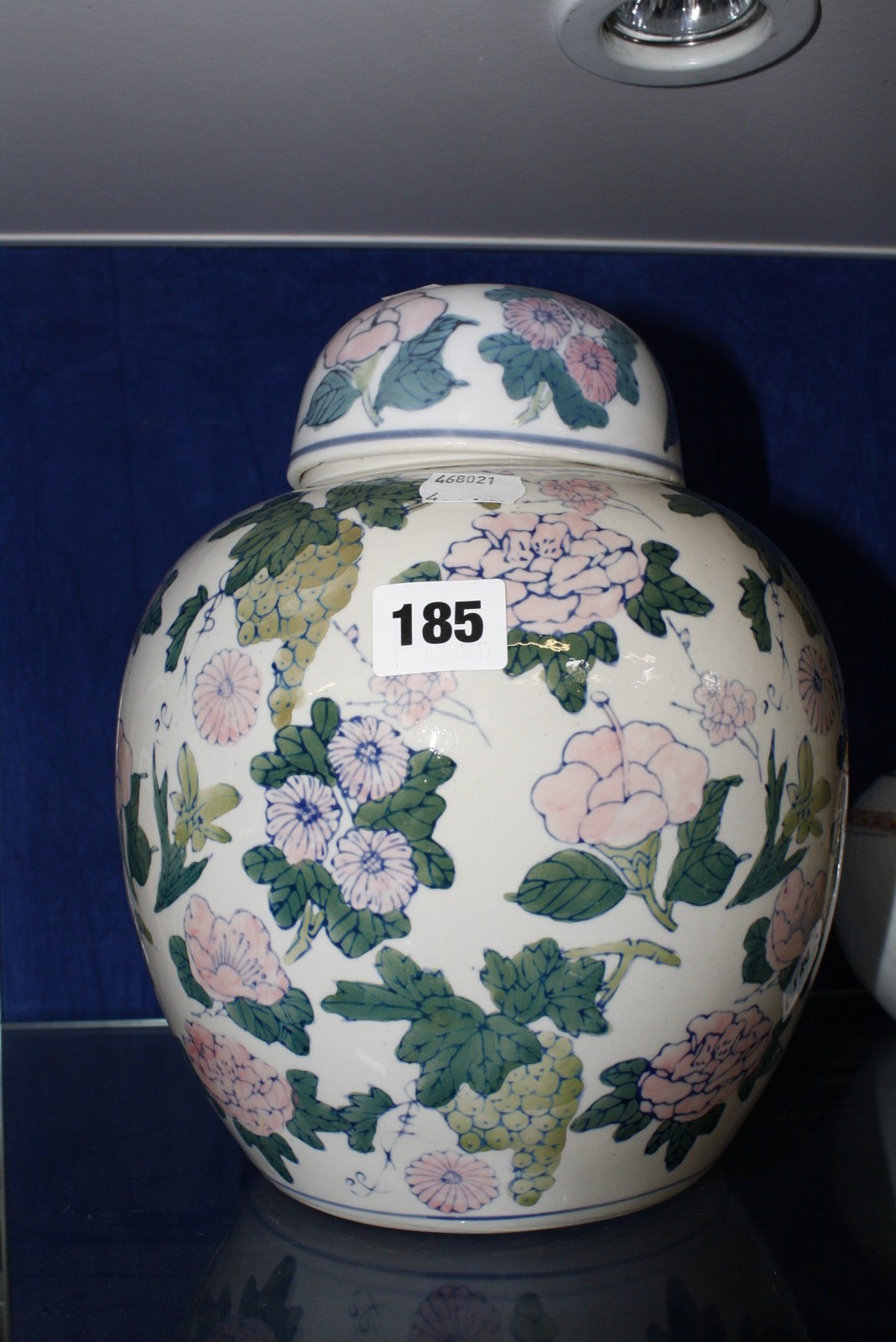 A 20th Century Chinese ginger jar, with cover, floral decorated, 25cm high Best Bid