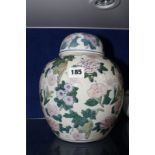 A 20th Century Chinese ginger jar, with cover, floral decorated, 25cm high Best Bid