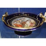 A 19th Century twin-handled comport with a sacrificial scene, Vienna mark in red to base and